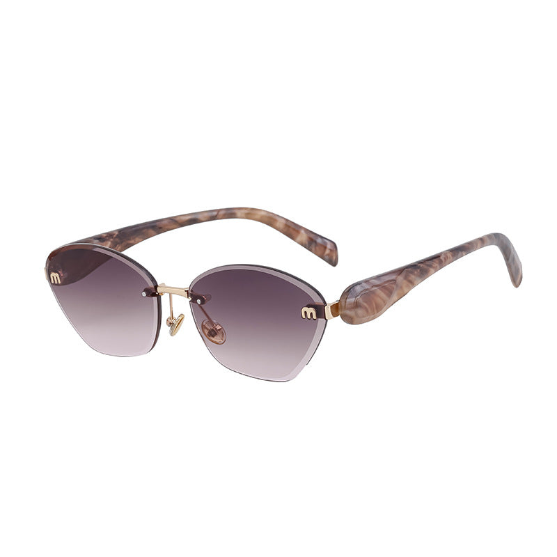Luxury Cat-Eye Frameless Sunglasses for Women – Diamond Cut Edge & UV Protection